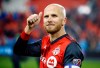 FILE - In this Oct. 28, 2018, file photo, Toronto FC midfielder Michael Bradley gives a thumbs-up to the crowd following a victory over Atlanta United in MLS soccer game action in Toronto. Bradley was called for the team's first training camp under coach Gregg Berhalter. But goalkeeper Brad Guzan and Jozy Altidore were omitted from a 27-man roster picked exclusively from players in Major League Soccer. (Cole Burston/The Canadian Press via AP, File)