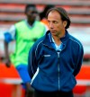 FILE - In this March 12, 2004, file photo, Haiti men's national team soccer coach Fernando Clavijo watches his team warm up at the Orange Bowl in Miami. Clavijo, a surprise starter for the 1994 U.S. World Cup team who went on to a coaching and management career in Major League Soccer, died Friday, Feb. 8, 2019, at his home in Fort Lauderdale, Fla., from multiple myeloma. He was 63. (AP Photo/Luis M. Alvarez, File)