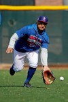 FILE - In this Monday, Feb. 18, 2019, file photo, Texas Rangers left fielder Willie Calhoun fields a ball during spring training baseball practice in Surprise, Ariz. Calhoun slimmed down quite a bit during the offseason. The 5-foot-8 player lost 24 pounds after changing his eating habits and committing to a fitness routine. (AP Photo/Charlie Riedel, File)