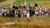 FILE - In this June 17, 2009, file photo, Phil Mickelson walks out of the rough on the 18th hole during his practice round for the U.S. Open Golf Championship at Bethpage State Park's Black Course in Farmingdale, N.Y. For such a strong course, Bethpage has a reputation for having a weak finishing hole. (AP Photo/Mel Evans, File)