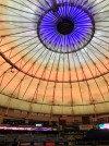 In this Tuesday, March 26, 2019 photo, the roof at Tropicana Field is illuminated with blue lights during the national anthem before an exhibition training baseball game between the Tampa Bay Rays and the Detroit Tiger in St. Petersburg, Fla. The Rays are exploring the possibility of using blue lights to tint the roof of in hopes of giving the domed the stadium a different look as well as making it easier for players to track flyballs during games. (AP Photo/Chris O'Meara)