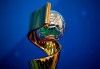 The Women's soccer World Cup trophy is on display during its presentation in a Paris school, Tuesday, May 14, 2019. When FIFA released its global strategy for women‚Äôs soccer last year, it was met by some skepticism. But soccer‚Äôs governing body is making some strides in implementing the long-range plan, against a backdrop of this summer‚Äôs World Cup in France. (AP Photo/Christophe Ena)