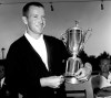 FILE - In this June 17, 1961, file photo, Gene Littler holds the trophy after winning the U.S. Open golf tournament in Birmingham, Mich. Littler, whose fluid swing carried him to 29 victories on the PGA Tour and a U.S. Open title, died Friday night, Feb. 15, 2019, with his family at his side. He was 88. (AP Photo/File)