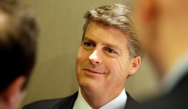 FILE - In this Nov. 18, 2015, file photo, New York Yankees owner Hal Steinbrenner smiles as he listens to a question while speaking with reporters at the baseball owners meeting in Dallas. Steinbrenner is pleased with the performance of his injury-decimated team. The Yankees have put 17 players on the injured list for 18 total stints. Still, they entered a three-game home series against AL East-leading Tampa Bay with a 26-16 record, a half-game behind the Rays.(AP Photo/LM Otero, File)