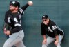 FILE - In this Feb. 16, 2019, file photo, Chicago White Sox manager Rick Renteria watches during a spring training baseball workout in Glendale, Ariz. The White Sox enter the season still believing they are setting themselves up for bigger things, despite missing out on the two prized free agents. (AP Photo/Morry Gash, File)
