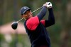 FILE - In this Feb. 17, 2019, file photo, Tiger Woods tees off on the 17th hole during the final round of the Genesis Open golf tournament at Riviera Country Club in the Pacific Palisades area of Los Angeles. Woods says a sore neck that kept him out of Bay Hill last week is no longer painful. Woods says his job is to make sure to stay fit and flexible. He used the word 