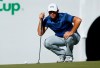 FILE- In this Feb. 4, 2018, file photo, Gary Woodland lines up his putt on the 16th green during the final round of the Waste Management Phoenix Open golf tournament in Scottsdale, Ariz. Woodland won the 2018 Phoenix Open for his first victory in five years. He returns to the desert this weekend, hoping to defend his title at the Greatest Show on Turf. (AP Photo/Ross D. Franklin, File)