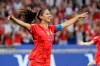 FILE - In this July 2, 2019, file photo, United States' Alex Morgan celebrates after scoring her side's second goal during the Women's World Cup semifinal soccer match against England at the Stade de Lyon, outside Lyon, France. The U.S. national soccer team star and husband Servando Carrasco, who is a midfielder for the LA Galaxy, are expecting their first child, according to an announcement Wednesday, Oct. 23, 2019, on social media. (AP Photo/Alessandra Tarantino)