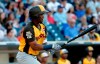 FILE - In this July 10, 2016, file photo, World Team's Eloy Jimenez hits against the U.S. Team during the seventh inning of the All-Star Futures baseball game in San Diego. A person familiar with the negotiations tells The Associated Press Wednesday, March 20, 2019, that the Chicago White Sox are nearing a $43 million, six-year contract with highly regarded outfield prospect Eloy Jimenez. (AP Photo/Lenny Ignelzi, File)