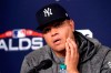 FILE - In this Oct. 4, 2018, file photo, New York Yankees pitcher Dellin Betances speaks to reporters during a baseball news conference at Fenway Park in Boston. Betances has inflammation in his right shoulder and will start the regular season on the injured list. New York general manager Brian Cashman said an MRI was done on Betances after the 6-8, 265-pound right-hander continued to lack velocity in his fastball. (AP Photo/Elise Amendola, File)