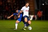 Tottenham Hotspur's Eric Dier, right, shields the ball from Colchester United's Luke Gambin during an English League Cup soccer match between Tottenham Hotspur and Colchester United's at the JobServe Community Stadium, Tuesday, Sept. 24, 2019, in Colchester, England. (Joe Giddens/PA via AP)
