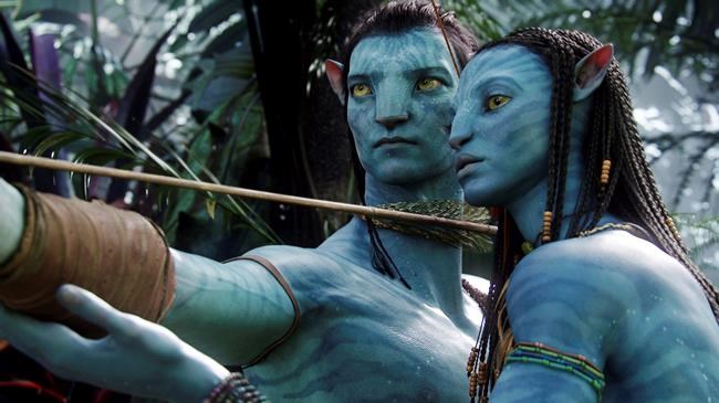 FILE - This image released by 20th Century Fox shows the characters Neytiri, right, and Jake in a scene from the 2009 movie
