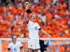 FILE - This July 7, 2019 file photo shows Megan Rapinoe celebrating her team's victory after the Women's World Cup final soccer match between U.S. and The Netherlands outside Lyon, France. Penguin Press announced Thursday, July 25, that Rapinoe’s book, currently untitled, will come out in Fall 2020. Penguin is calling the book a “perfect vehicle” for an “honest, thoughtful, unapologetic” take on everything from soccer to nationalism to gay rights. (AP Photo/David Vincent, File)