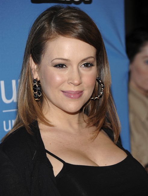 FILE - In this May 17, 2011 file photo, actress Alyssa Milano arrives at the UNICEF Playlist with the A-List benefit in Los Angeles. Milano gave birth to a baby boy on Wednesday, Aug. 31, 2011. Milo Thomas Bugliari is the first child for Milano and her agent husband David Bugliari. The couple were married in 2009. (AP Photo/Dan Steinberg, file)