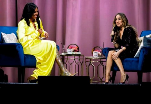Former first lady Michelle Obama, left, is interviewed by Sarah Jessica Parker during an appearance for her book, 