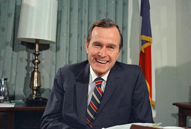 FILE - In this Dec. 18, 1970, file photo, newly appointed United Nations Ambassador George H. Bush smiles. Bush has died at age 94. Family spokesman Jim McGrath says Bush died shortly after 10 p.m. Friday, Nov. 30, 2018, about eight months after the death of his wife, Barbara Bush. (AP Photo/John Duricka, File)