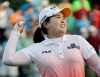 Inbee Park throws the ball up into the stands after winning a sudden death play during the LPGA Championship golf tournament at Locust Hill Country Club in Pittsford, N.Y. , on Sunday June 9, 2013 (AP Photo/Gary Wiepert)
