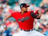 FILE - In this May 25, 2019, file photo, Cleveland Indians starting pitcher Carlos Carrasco delivers against the Tampa Bay Rays during the first inning of a baseball game in Cleveland. Indians right-hander Carrasco has returned to the mound in the minor leagues as he tries to come back after being diagnosed with leukemia. (AP Photo/Ron Schwane, File)