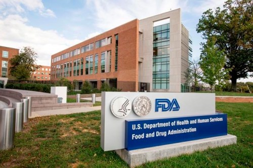 FILE - This Oct. 14, 2015, file photo shows the Food and Drug Administration campus in Silver Spring, Md. The first generic version of the popular Advair asthma inhaler has been approved by U.S. regulators. The FDA on Wednesday, Jan. 30, 2019, approved Mylan's version in three strengths for ages 4 and up. (AP Photo/Andrew Harnik, File)