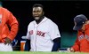 FILE - In this Oct. 10, 2016, file photo, Boston Red Sox designated hitter David Ortiz encourages the crowd from the dugout during the eighth inning in Game 3 of baseball's American League Division Series against the Cleveland Indians in Boston. Former Boston Red Sox slugger Ortiz was shot and wounded in his native Dominican Republic, his father told ESPN on Sunday, June 9, 2019. (AP Photo/Elise Amendola, File)