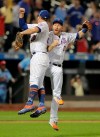 New York Mets first baseman Pete Alonso, left, and third baseman Todd Frazier celebrate after the Mets defeated the St. Louis Cardinals 8-7 during a baseball game Saturday, June 15, 2019, in New York. (AP Photo/Julio Cortez)