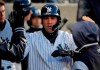 New York Yankees' Gary Sanchez celebrates with teammates in the dugout after hitting a solo home run against the Detroit Tigers during the second inning of a baseball game, Monday, April 1, 2019, in New York. (AP Photo/Julie Jacobson)