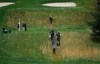 Lucas Glover, bottom left, Corey Conners, of Canada, left center, and Adam Long, right center, walks down a slope from the fourth tee during a practice round for the PGA Championship golf tournament, Monday, May 13, 2019, in Farmingdale, N.Y. (AP Photo/Julie Jacobson)