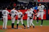 The New York Yankees celebrate their 3-1 win over the Detroit Tigers in a baseball game, Monday, April 1, 2019, in New York. (AP Photo/Julie Jacobson)