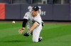 New York Yankees right fielder Aaron Judge makes a diving catch on a ball hit by Minnesota Twins' Jorge Polanco during the third inning of Game 1 of an American League Division Series baseball game, Friday, Oct. 4, 2019, in New York.(AP Photo/Seth Wenig)