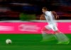 FILE - In this Oct. 11, 2019, file image taken with a slow shutter speed a soccer player runs for the ball during the Euro 2020 group A qualifying soccer match in Prague, Czech Republic. A study, from the University of Glasgow and reported Monday, Oct. 21, in New England Journal of Medicine, of former professional soccer players in Scotland found that they were less likely to die of common causes such as heart disease and cancer compared with the general population but more likely to die from dementia. (AP Photo/Petr David Josek, File)