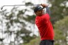 FILE - In this June 16, 2019, file photo Tiger Woods watches his tee shot on the second hole during the final round of the U.S. Open Championship golf tournament in Pebble Beach, Calif. Woods has played just three tournaments, 10 rounds, since he won the Masters. For only the seventh time in his career, he went from one major to the next without having played in between, and then he missed the cut at Bethpage Black in the PGA Championship. (AP Photo/Carolyn Kaster, File)