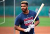 FILE - In this Feb. 15, 2019, file photo Cleveland Indians' Bobby Bradley waits his turn at batting practice during informal workouts at the team's baseball training facility in Goodyear, Ariz. The Indians have recalled slugger Bradley from Triple-A Columbus. Cleveland had been contemplating the move for some time to add some pop to its lineup, and the club brought up Bradley on Sunday, June 23, before going for a three-game sweep over the Detroit Tigers. (AP Photo/Ross D. Franklin, File)