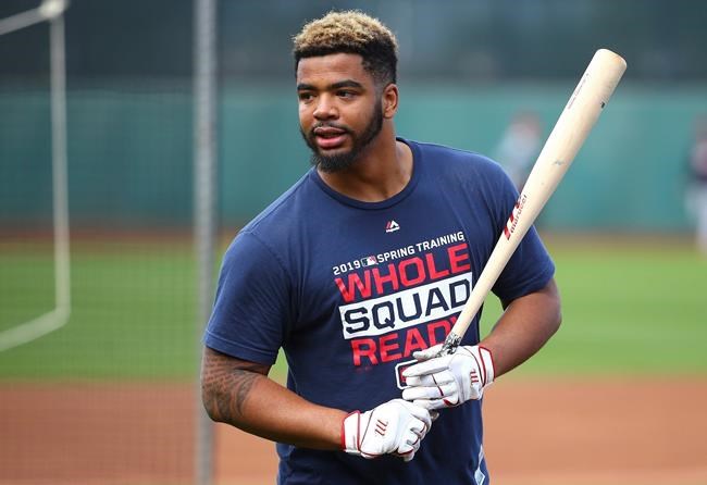 FILE - In this Feb. 15, 2019, file photo Cleveland Indians' Bobby Bradley waits his turn at batting practice during informal workouts at the team's baseball training facility in Goodyear, Ariz. The Indians have recalled slugger Bradley from Triple-A Columbus. Cleveland had been contemplating the move for some time to add some pop to its lineup, and the club brought up Bradley on Sunday, June 23, before going for a three-game sweep over the Detroit Tigers. (AP Photo/Ross D. Franklin, File)