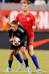 U.S. defender Walker Zimmerman (4) collides with Mexico forward Javier Hernandez (14) in the first half of an international friendly soccer match, Friday, Sept. 6, 2019, in East Rutherford, NJ. (AP Photo/Kathy Willens)