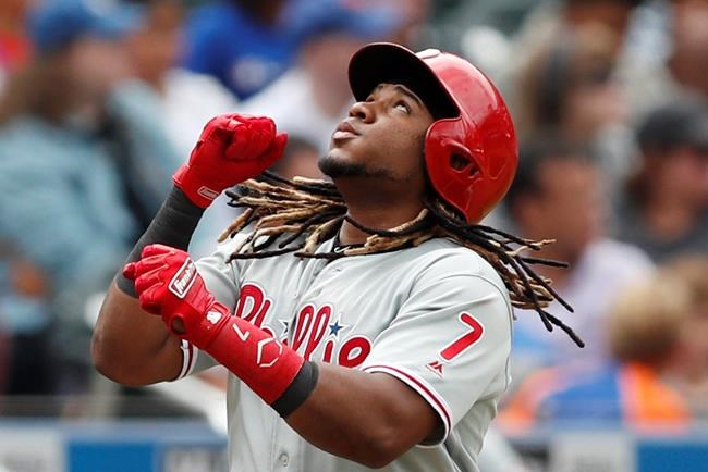 Philadelphia Phillies' Maikel Franco (7) reacts running down the third base line after hitting a two-run, home run during the sixth inning of a baseball game against the New York Mets, Sunday, Sept. 8, 2019, in New York. (AP Photo/Kathy Willens)