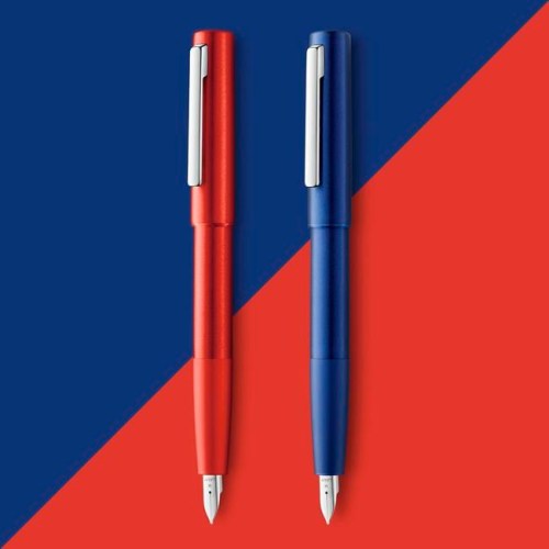 This photo provided by LAMY shows their Aion pen in red and blue. In our computerized age, the old-fashioned fountain pen _ all jazzed up _ is making a surprise comeback. (LAMY via AP)
