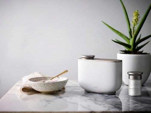 This photo shows one of Aera's scent diffusers. Aera's technology allows the fragrances to diffuse in a unique way, so that all the aromatic notes disperse together. (Scott Pitts/Aera via AP)