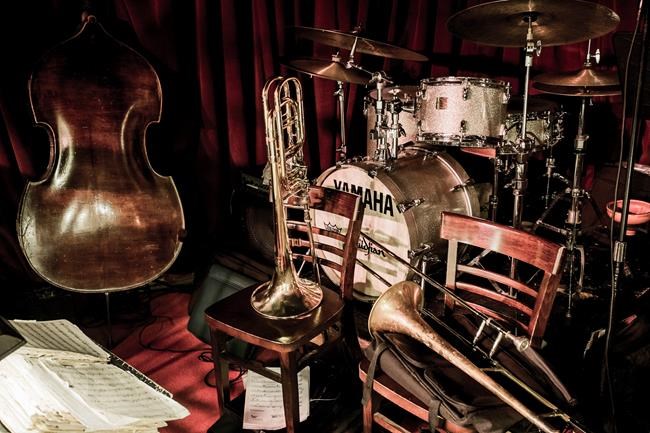 This undated photo provided by the Village Vanguard shows various instruments on the stage at the club in New York ready for the Vanguard 16 piece Jazz orchestra. The orchestra has played at the Vanguard every Monday night since 1966 and is a New York City tradition. New York has long been a city known for jazz. What's less known is how kid- and family-friendly jazz performances can be. (Michael Larson/Village Vanguard via AP)
