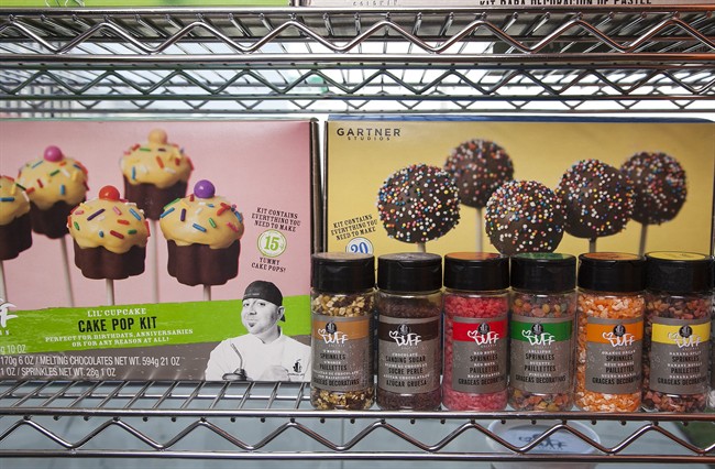 This image taken on Wednesday, June 20, 2012, shows cake mix products by Duff Goldman, chef and owner of Charm City Cakes West, displayed at his new venture, Duff's Cakemix, in Los Angeles. (AP Photo/Damian Dovarganes)