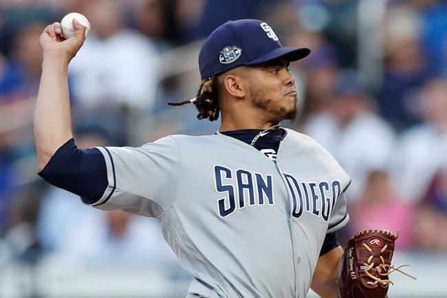 San Diego Padres starting pitcher Dinelson Lamet winds up during the first inning of a baseball game against the New York Mets, Wednesday, July 24, 2019, in New York. (AP Photo/Kathy Willens)