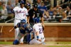 Los Angeles Dodgers catcher Will Smith, beflow left, applies a late tag on New York Mets' J.D. Davis, (28) who scores on Brandon Nimmo's two-run triple during the second inning of a baseball game, Sunday, Sept. 15, 2019, in New York. Mets' Robinson Cano, above left, also scored on the play. Home plate umpire Vic Carapazza watches the plate. (AP Photo/Kathy Willens)