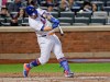 New York Mets' Wilson Ramos hits an RBI-double during the second inning of a baseball game against the Cincinnati Reds, Monday, April 29, 2019, in New York. (AP Photo/Frank Franklin II)