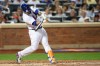 New York Mets' Wilson Ramos hits a two-run double during the fourth inning of the team's baseball game against the Cleveland Indians, Thursday, Aug. 22, 2019, in New York. (AP Photo/Mary Altaffer)