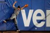 Arizona Diamondbacks left fielder Josh Rojas leaps for but can't reach an RBI double by New York Mets' Todd Frazier during the fourth inning of a baseball game Tuesday, Sept. 10, 2019, in New York. (AP Photo/Kathy Willens)