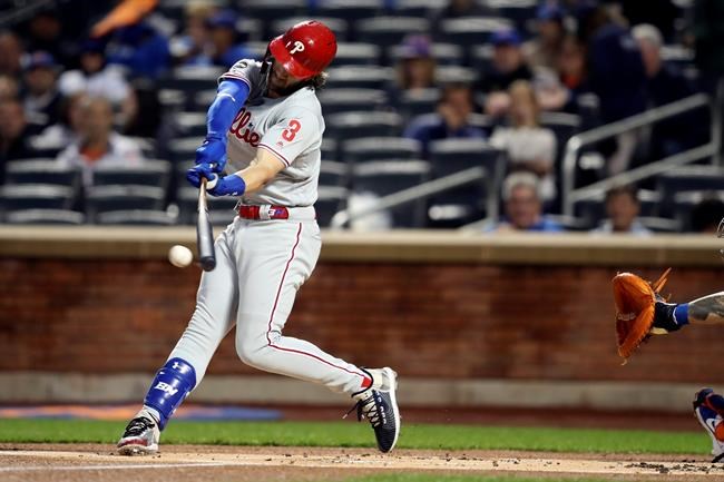Philadelphia Phillies' Bryce Harper bats during the first inning of a baseball game against the New York Mets, Friday, Sept. 6, 2019, in New York. (AP Photo/Mary Altaffer)