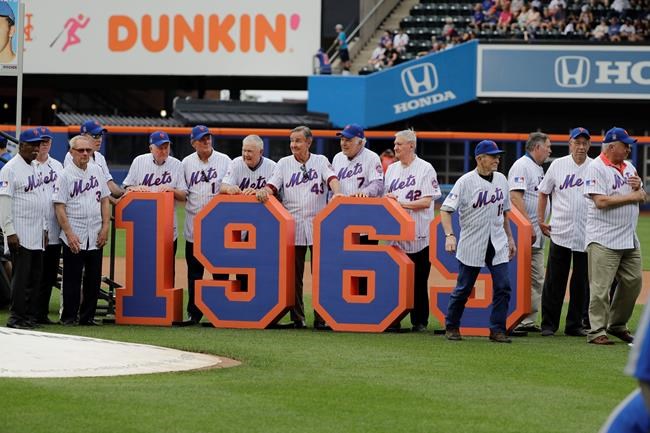 The 1969 mets leave the field after a pre-game ceremony to honor them before a baseball game against the Atlanta Braves Saturday, June 29, 2019, in New York. (AP Photo/Frank Franklin II)