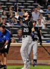 Colorado Rockies' David Dahl (26) reacts as he comes home after hitting a two-run home run during the eighth inning of the team's baseball game against the New York Mets on Friday, June 7, 2019, in New York. (AP Photo/Bill Kostroun)