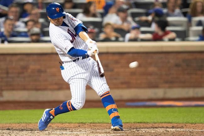 New York Mets' Pete Alonso hits a double in the seventh inning of the team's baseball game against the Miami Marlins, Tuesday, Aug. 6, 2019, in New York. (AP Photo/Mary Altaffer)