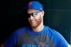 New York Mets' pitcher Zack Wheeler talks to teammates during the fourth inning of a baseball game against the Pittsburgh Pirates Sunday, July 28, 2019, in New York. (AP Photo/Frank Franklin II)