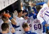 New York Mets' Pete Alonso, center, celebrates with teammates after hitting a home run during the seventh inning of a baseball game against the Colorado Rockies, Saturday, June 8, 2019, in New York. (AP Photo/Bill Kostroun)